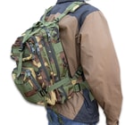 Full image of a person wearing the Tactical Assault Backpack.